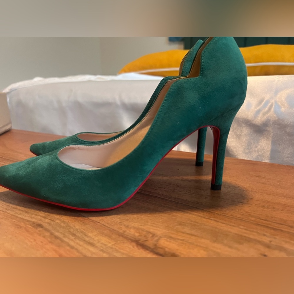 Green with red bottom heels